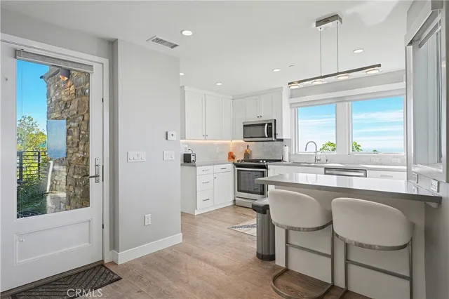 a view of a living room with a large window