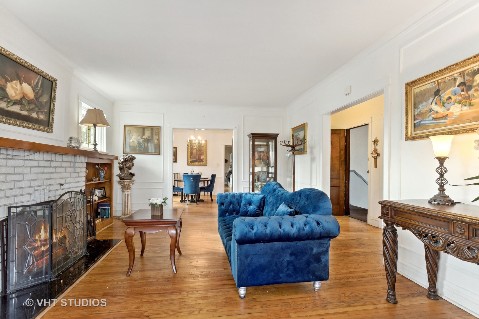 3122 Wisconsin Avenue Berwyn, IL 60402 - Photo 11 of 32 a living room with furniture and a fireplace