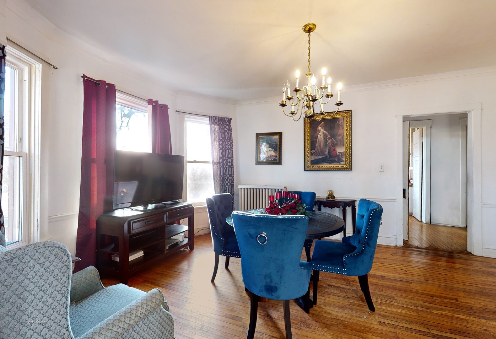 3122 Wisconsin Avenue Berwyn, IL 60402 - Photo 12 of 32 a living room with furniture a window and a flat screen tv