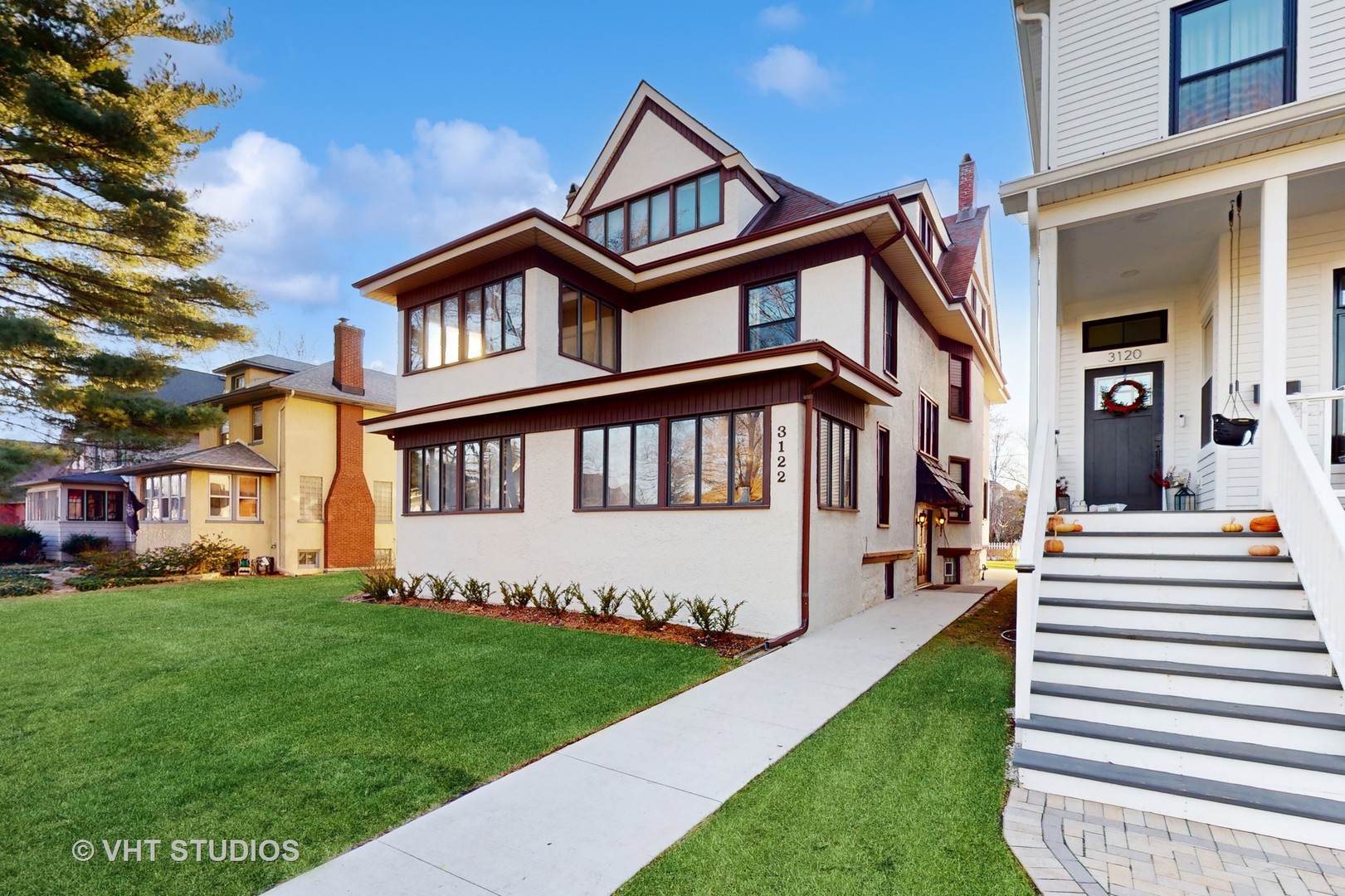 3122 Wisconsin Avenue Berwyn, IL 60402 - Photo 3 of 32 a view of a house with a yard and deck