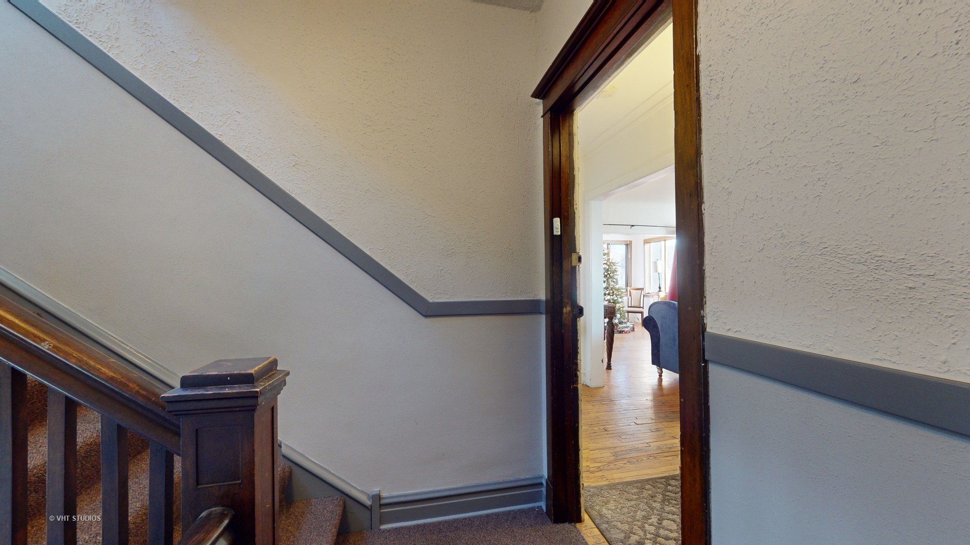 3122 Wisconsin Avenue Berwyn, IL 60402 - Photo 7 of 32 a view of a hallway with wooden floor and staircase