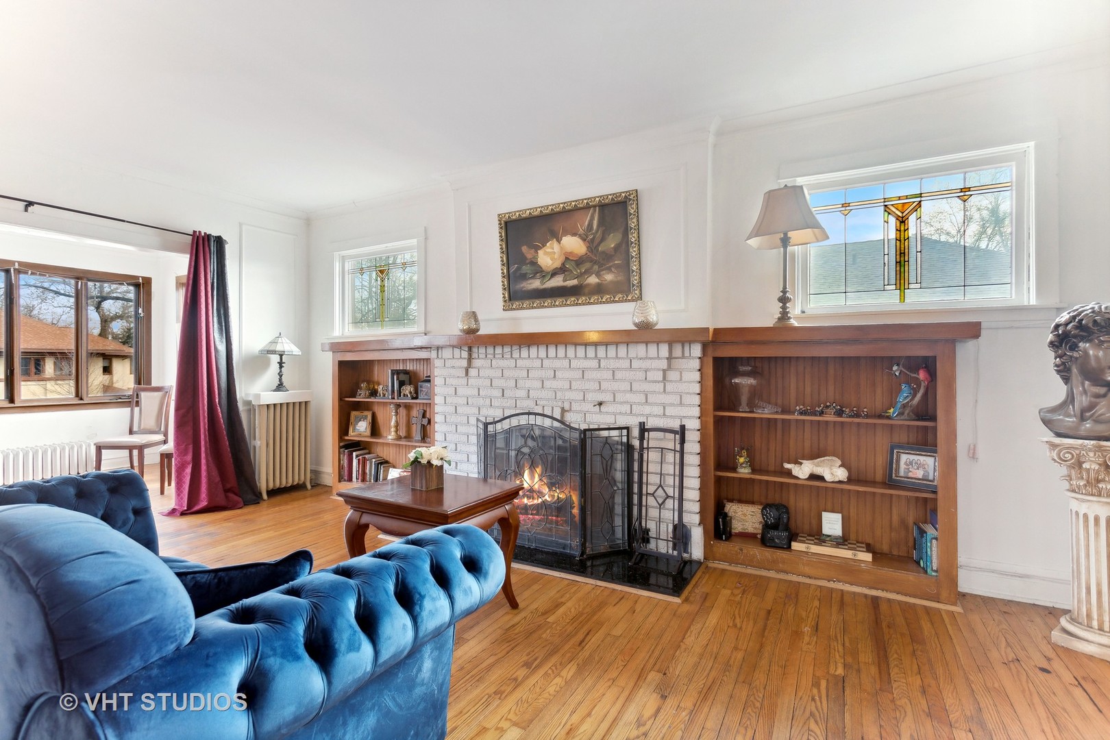 3122 Wisconsin Avenue Berwyn, IL 60402 - Photo 9 of 32 a living room with furniture and a fireplace