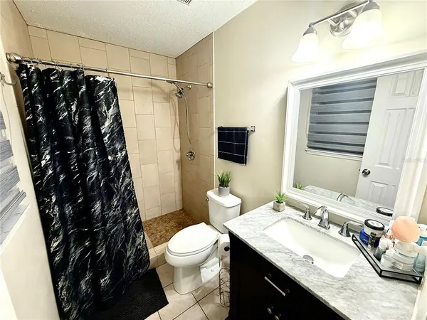 a bathroom with a sink and a toilet