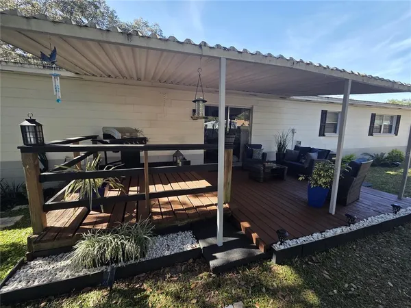 a view of a balcony with chairs