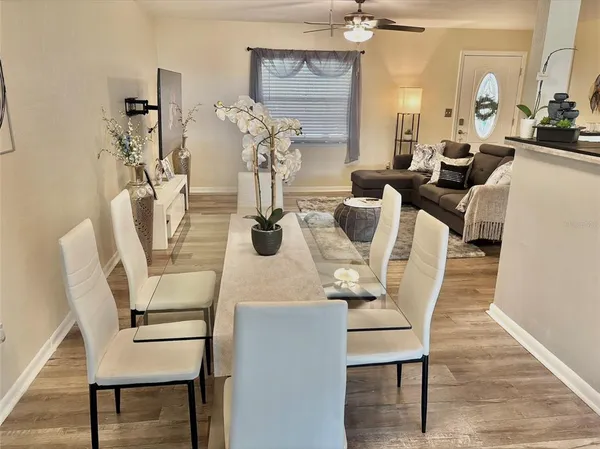 a view of a dining room with furniture