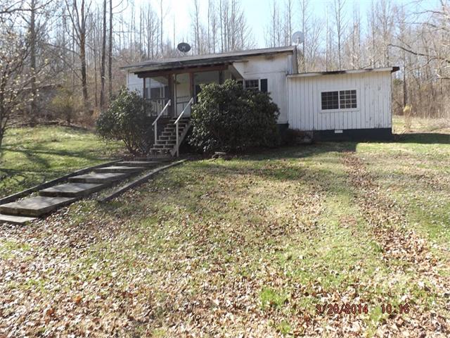 705 Stella Road Prospect, TN 38477 - Photo 1 of 10 a view of backyard of house
