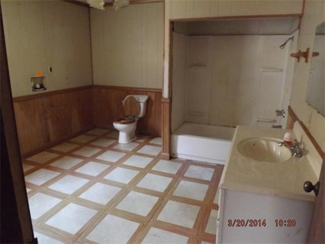 705 Stella Road Prospect, TN 38477 - Photo 7 of 10 a bathroom with a sink and a toilet