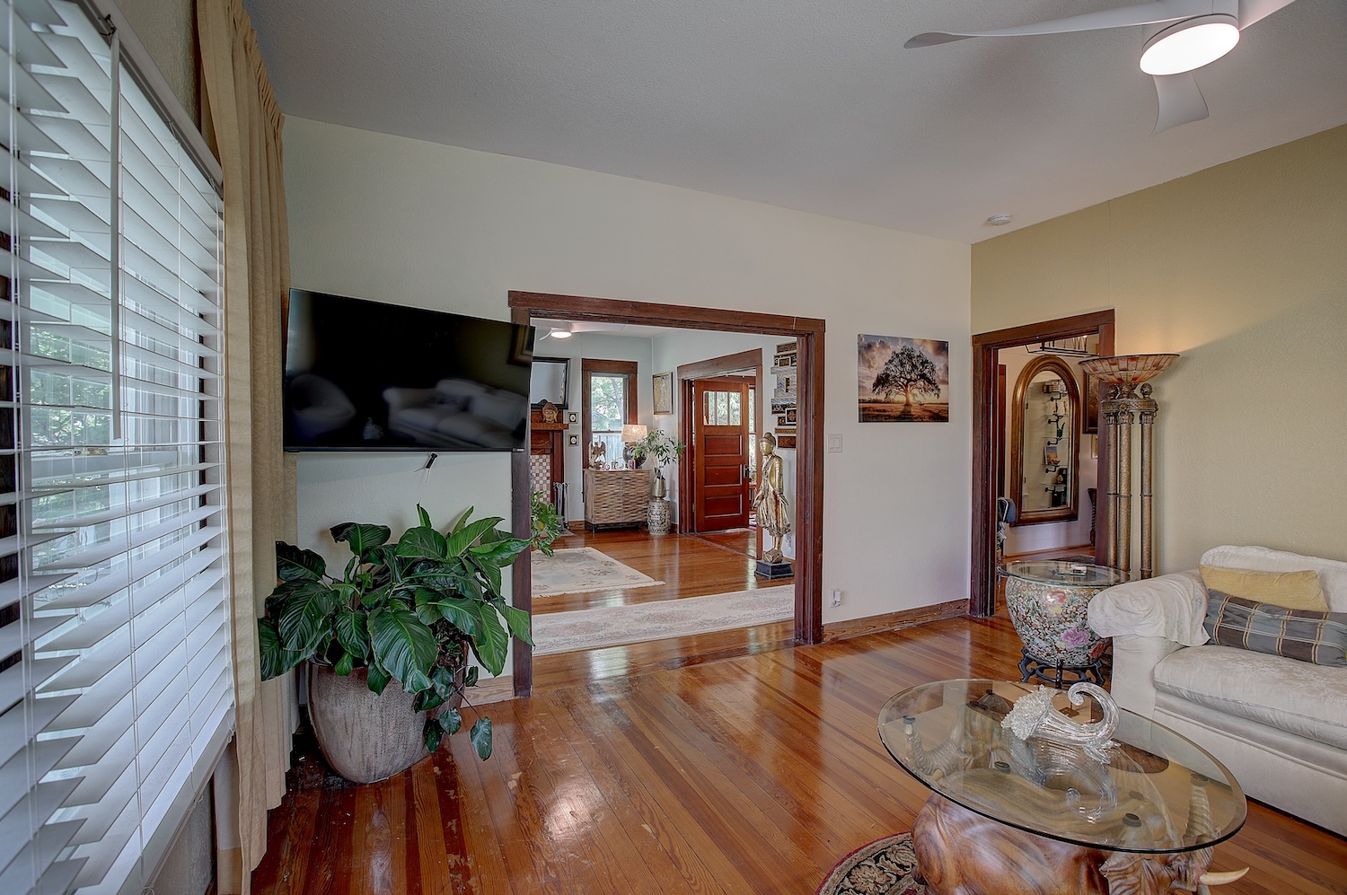 1903 South Austin Avenue Georgetown, TX 78626 - Photo 13 of 40 Formerly a bedroom this very large room has been opened to be a TV/room. Opening it to the living room allows for quiet evenings, or visiting with family, friends and entertaining