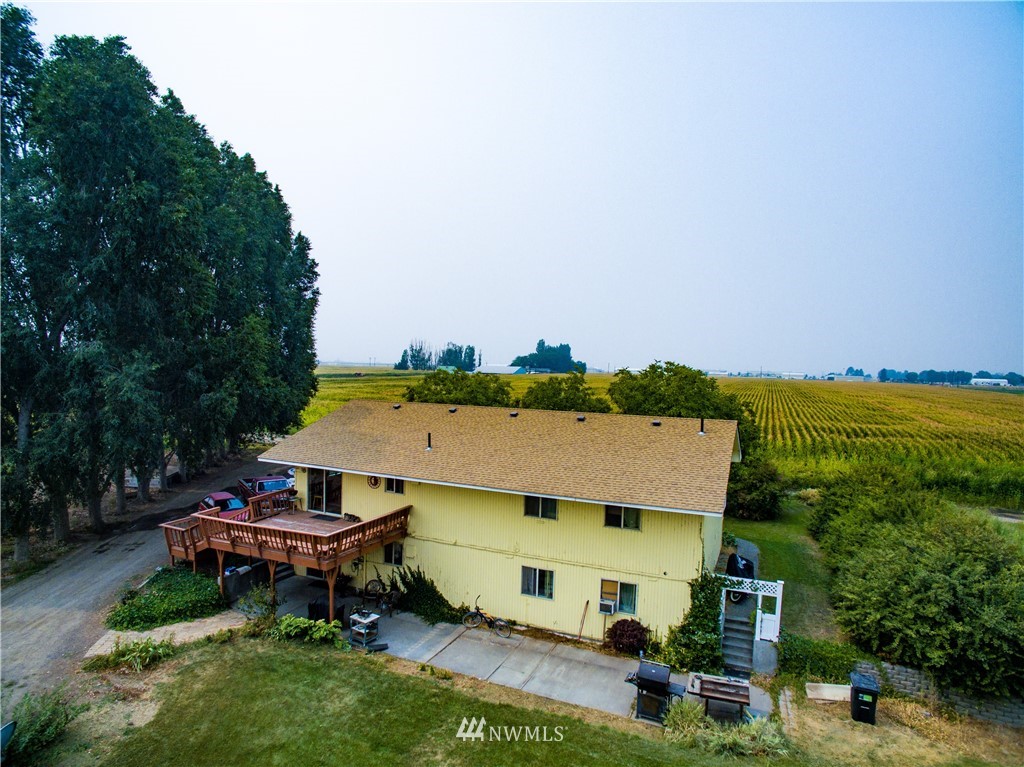3956 L L.2 Road Northeast Moses Lake, WA 98837 - Photo 3 of 14 an aerial view of a house with swimming pool backyard and outdoor seating