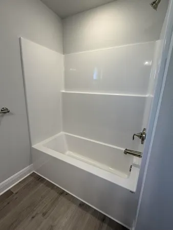 an empty room with windows and view