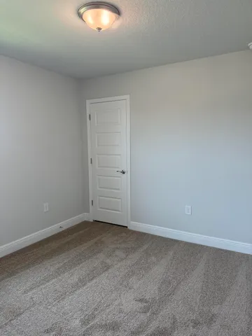 an empty room with an entryway
