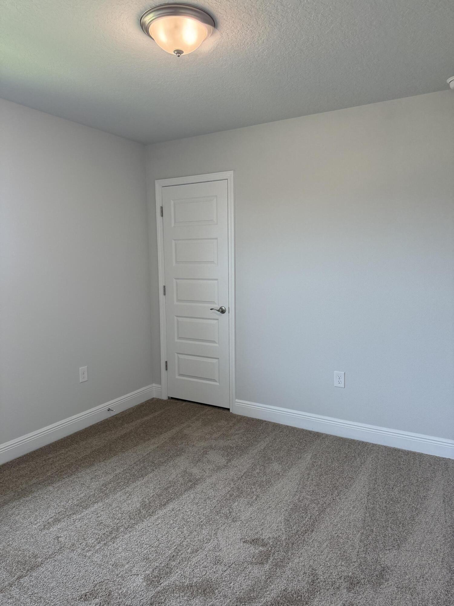 190 Ridgeway Circle Crestview, FL 32536 - Photo 6 of 19 an empty room with an entryway