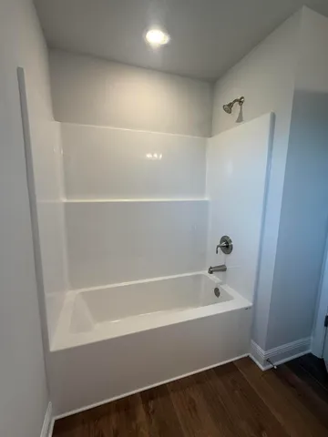 a bathroom with a bathtub