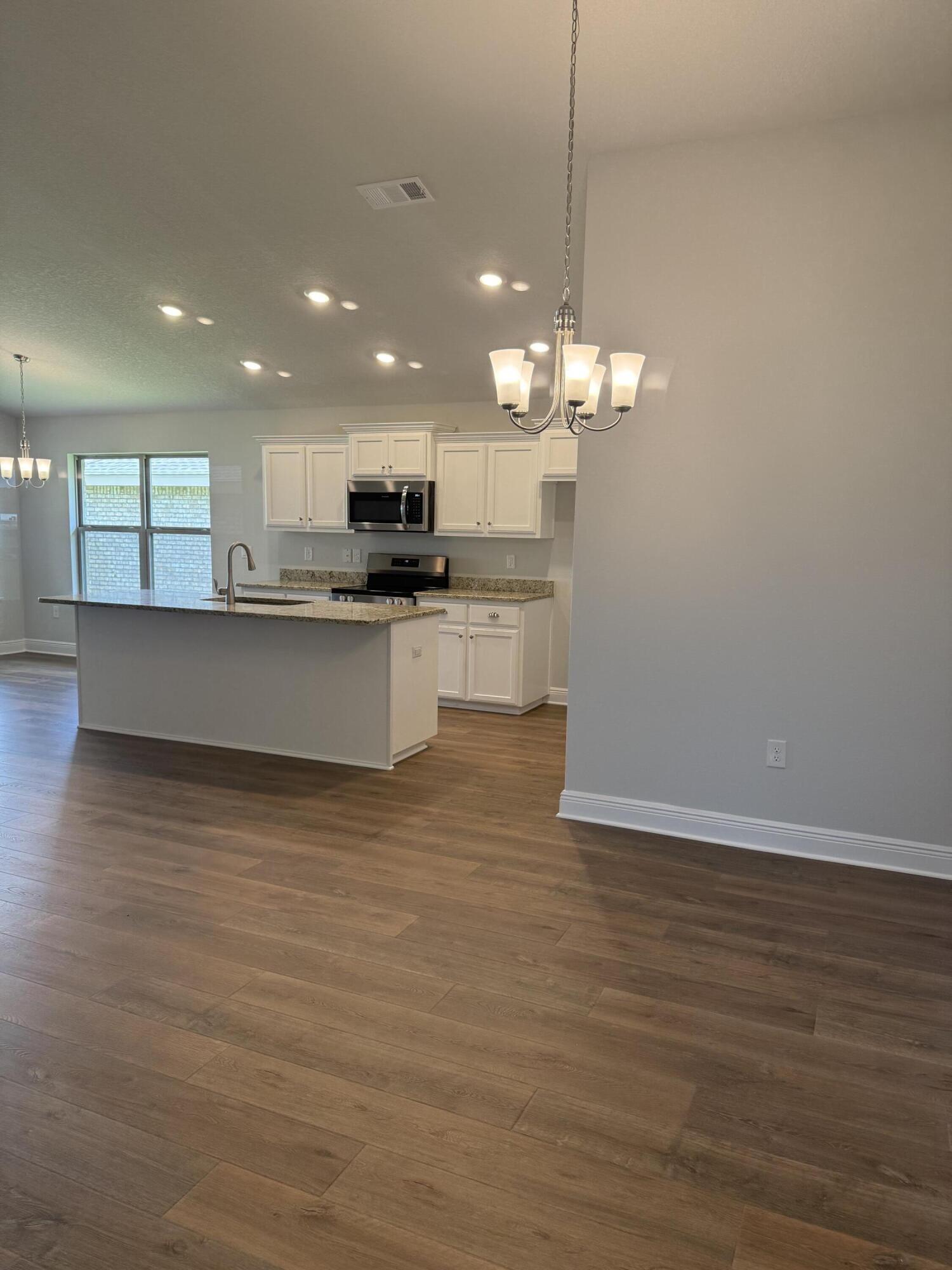 190 Ridgeway Circle Crestview, FL 32536 - Photo 9 of 19 a view of a kitchen and microwave