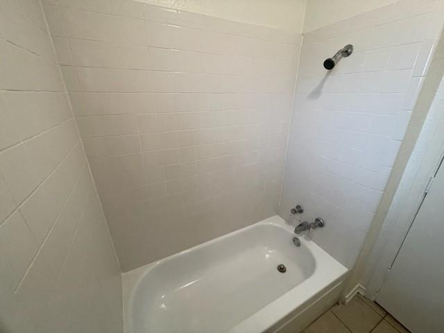 804 Cullum Court, Unit A Hurst, TX 76053 - Photo 18 of 29 a bathroom with a white bath tub and a shower