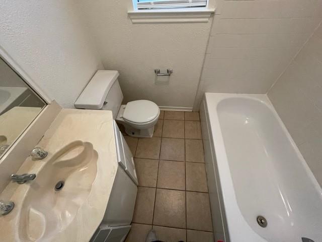 804 Cullum Court, Unit A Hurst, TX 76053 - Photo 24 of 29 a bathroom with a sink and toilet