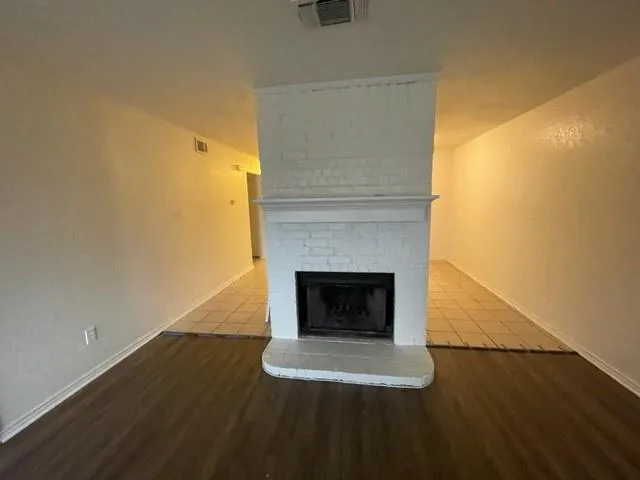 a living room with a fireplace