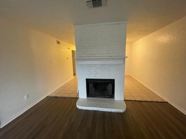 804 Cullum Court, Unit A Hurst, TX 76053 - Photo 8 of 29 a living room with a fireplace