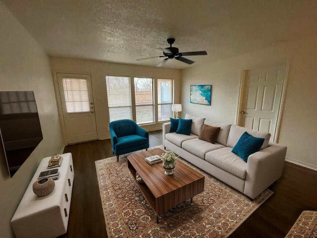 804 Cullum Court, Unit A Hurst, TX 76053 - Photo 10 of 29 a living room with furniture a ceiling fan and a window