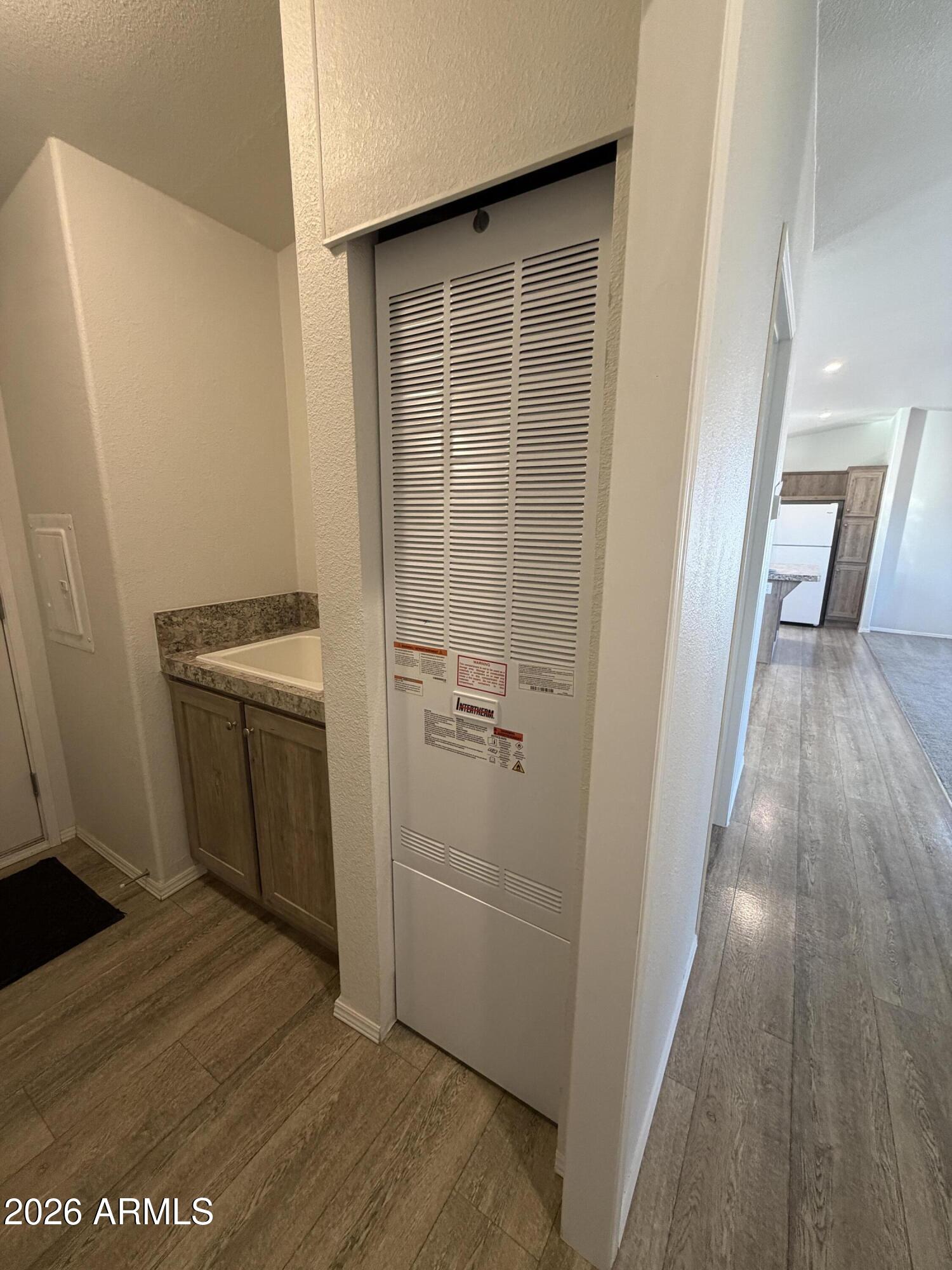 1122 Sheepshead Crossing Road Cornville, AZ 86325 - Photo 7 of 13 a view of a kitchen from the hallway