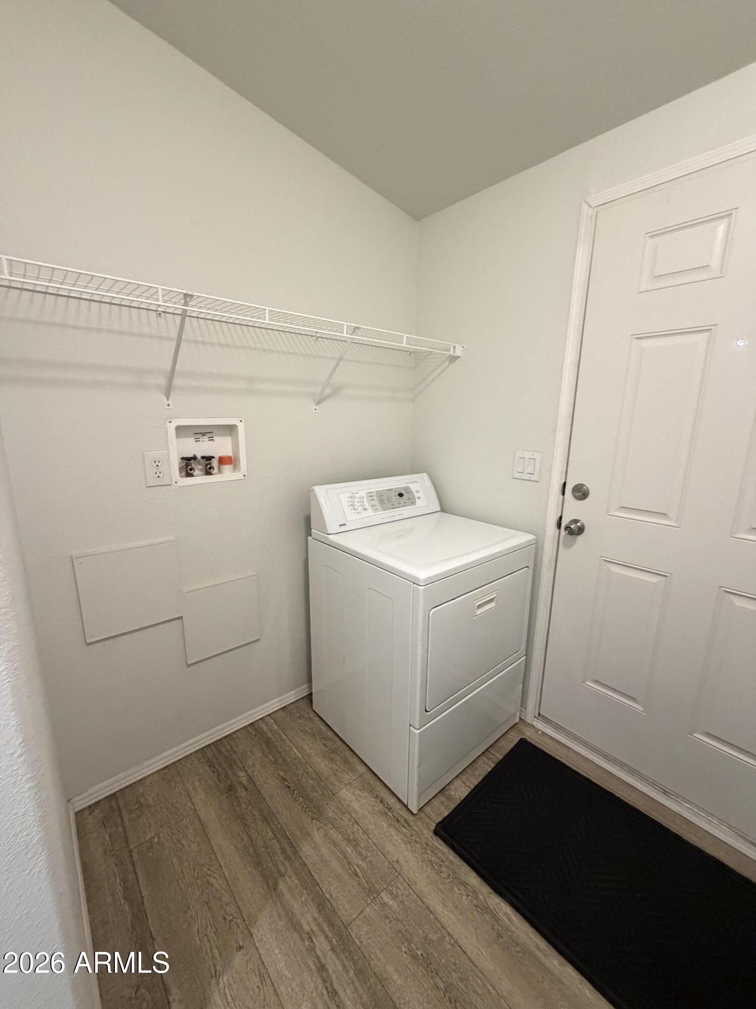 1122 Sheepshead Crossing Road Cornville, AZ 86325 - Photo 8 of 13 a utility room with dryer and washer