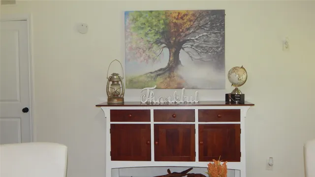 a room with a table and a window