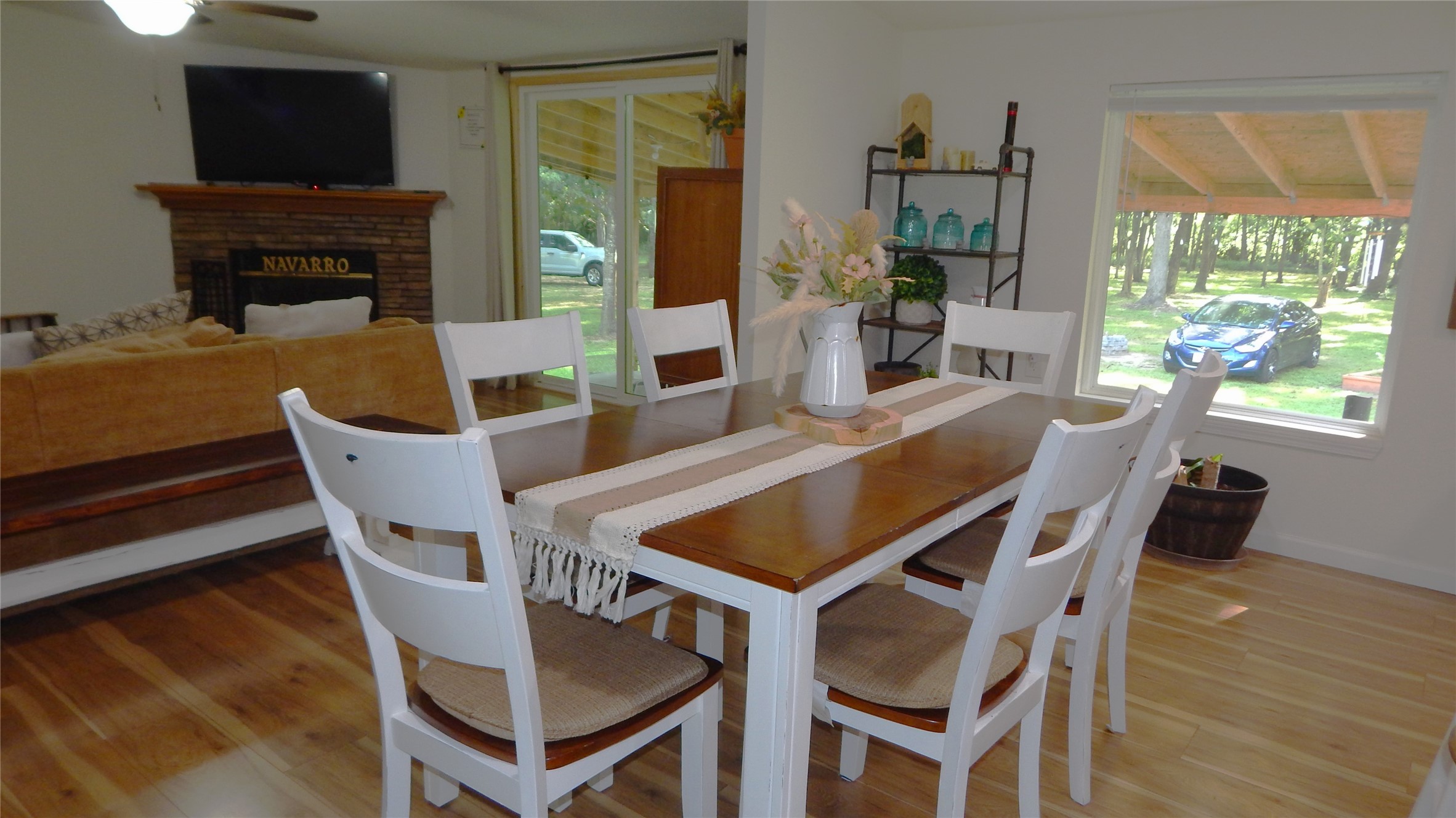 142 County Road 1332 Liberty, TX 77575 - Photo 6 of 50 a view of a dining room with furniture window and wooden floor