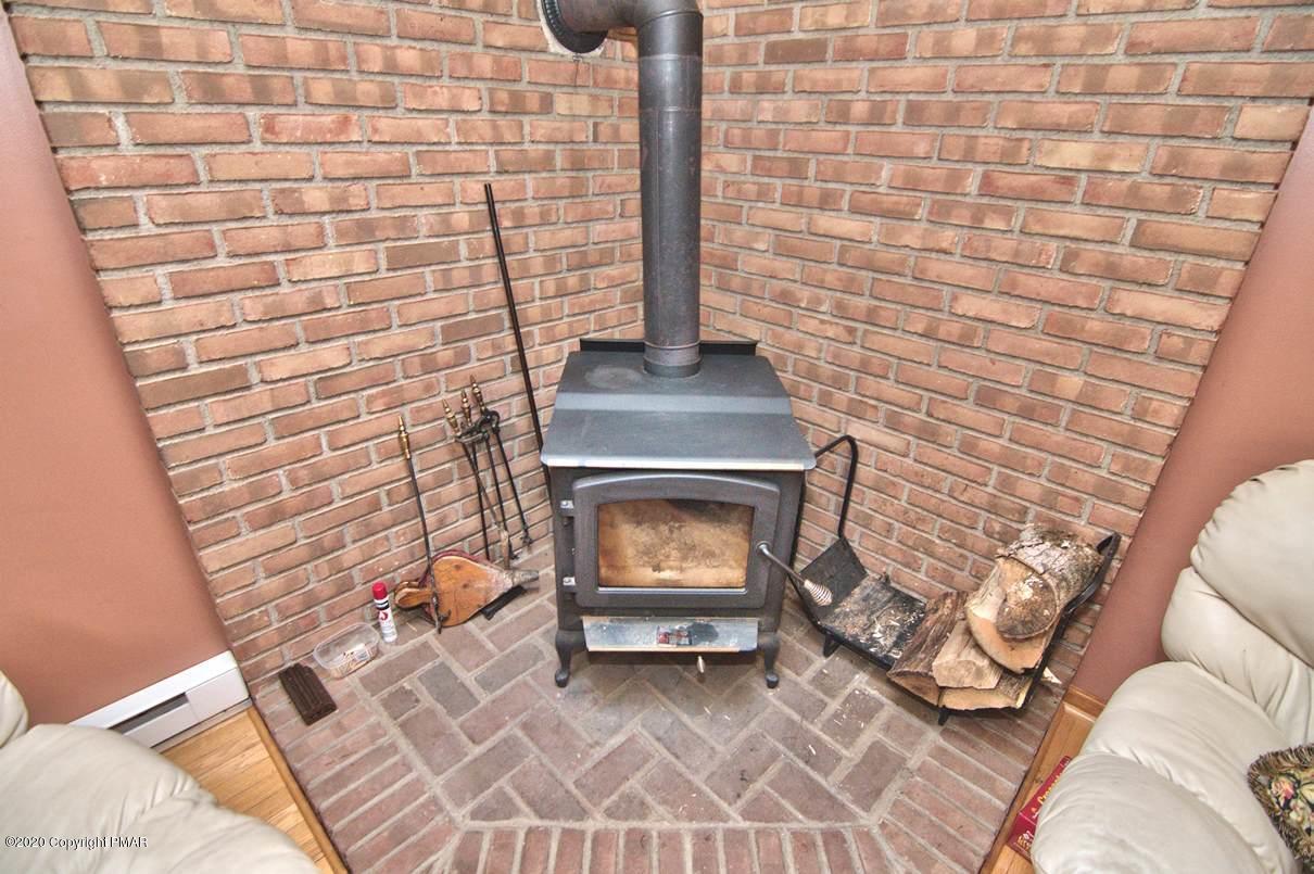 425 Ridge Circle Cresco, PA 18326 - Photo 17 of 58 Wood stove + hearth