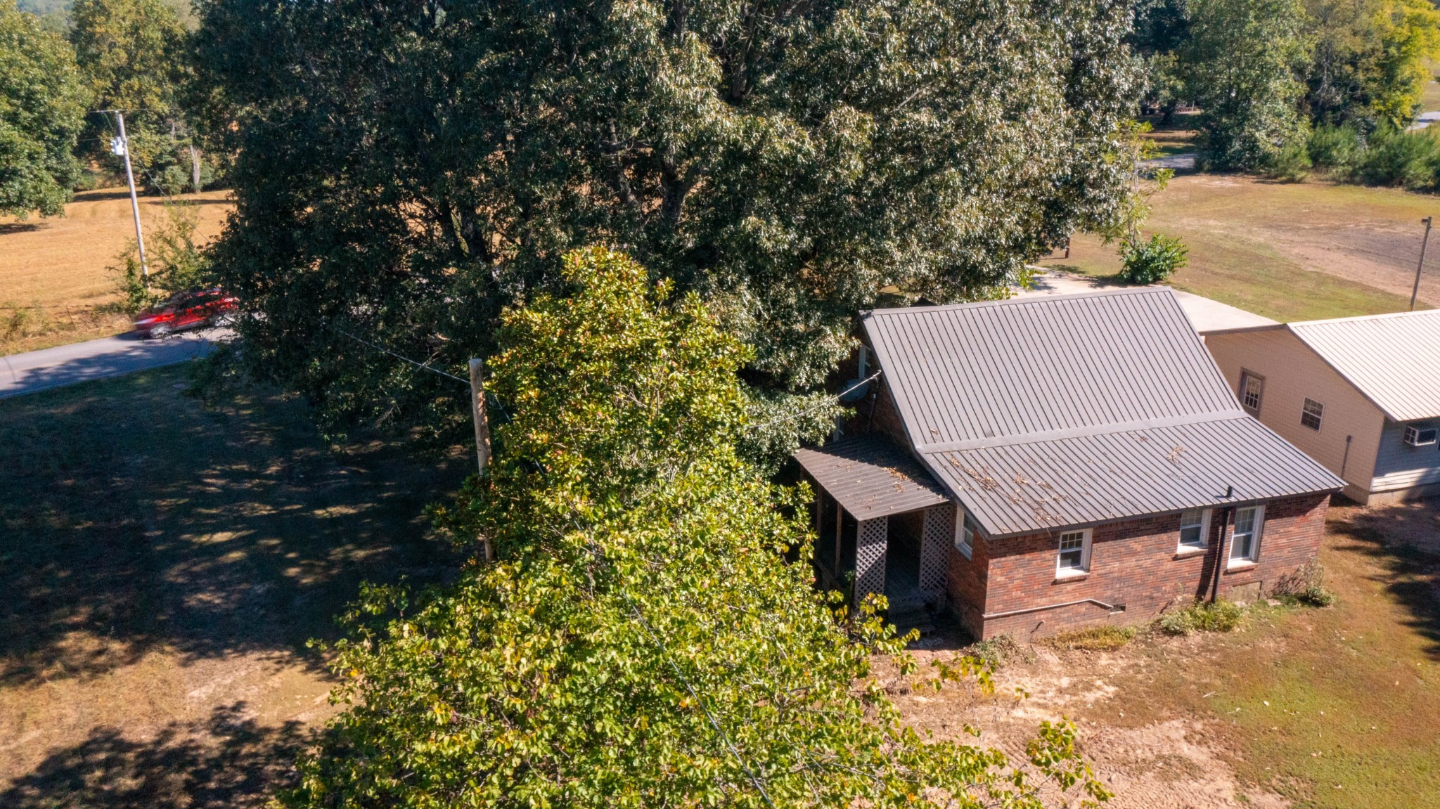 1210 Garton Road Burns, TN 37029 - Photo 21 of 34 an aerial view of a house with a yard