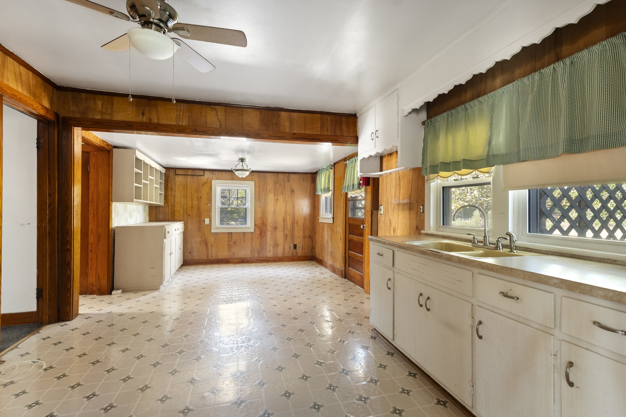 1210 Garton Road Burns, TN 37029 - Photo 23 of 34 a large kitchen with lot of counter space and wooden floor