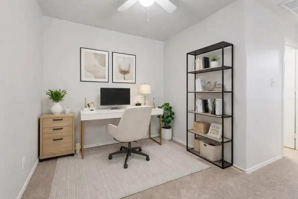 a view of staircase with white walls