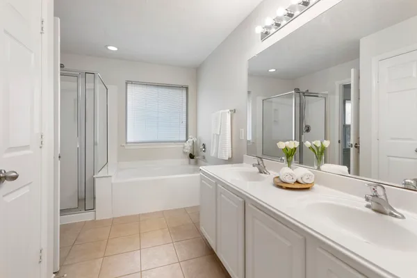 a white bath tub sitting in a bathroom