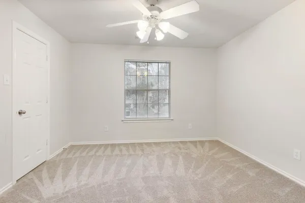 a bathroom with a sink toilet and a mirror