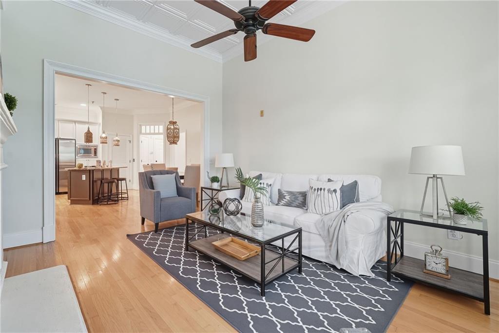 825 Highland Lane Northeast, Unit 1312 Atlanta, GA 30306 - Photo 24 of 46 a living room with furniture and a table