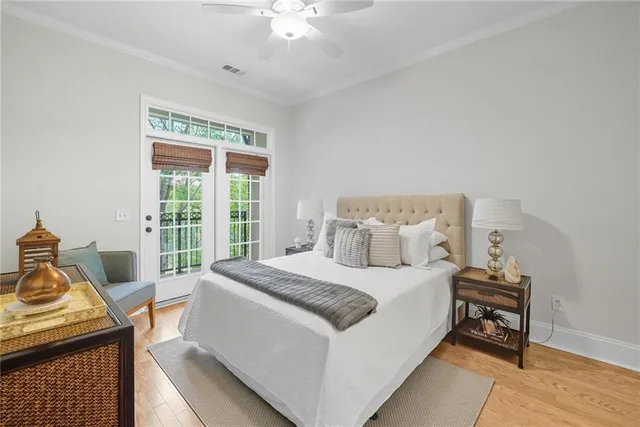 a bedroom with a bed and a table