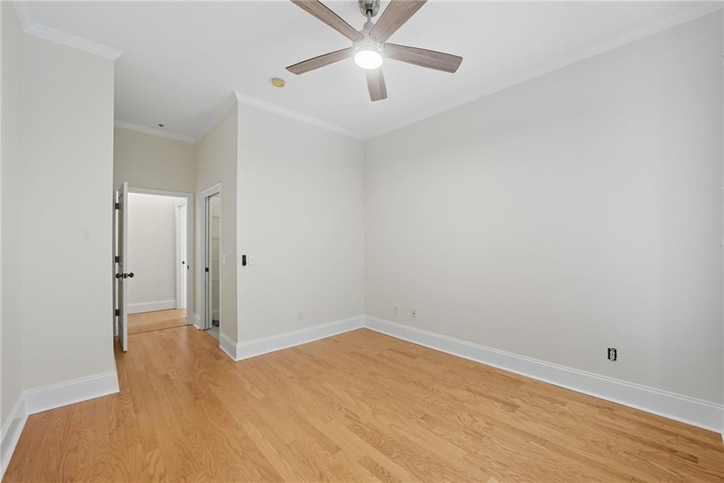 825 Highland Lane Northeast, Unit 1312 Atlanta, GA 30306 - Photo 36 of 46 wooden floor in an empty room