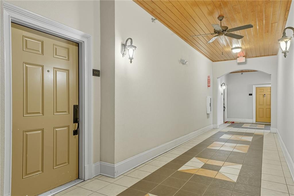 825 Highland Lane Northeast, Unit 1312 Atlanta, GA 30306 - Photo 38 of 46 a view of a hallway with a front door