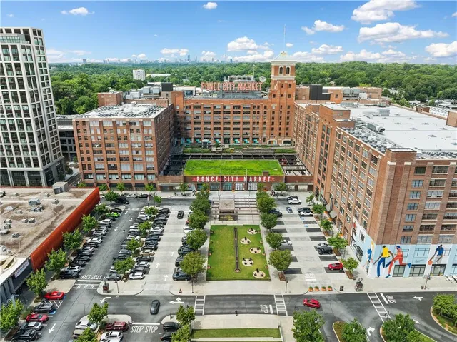 a view of a city with tall buildings