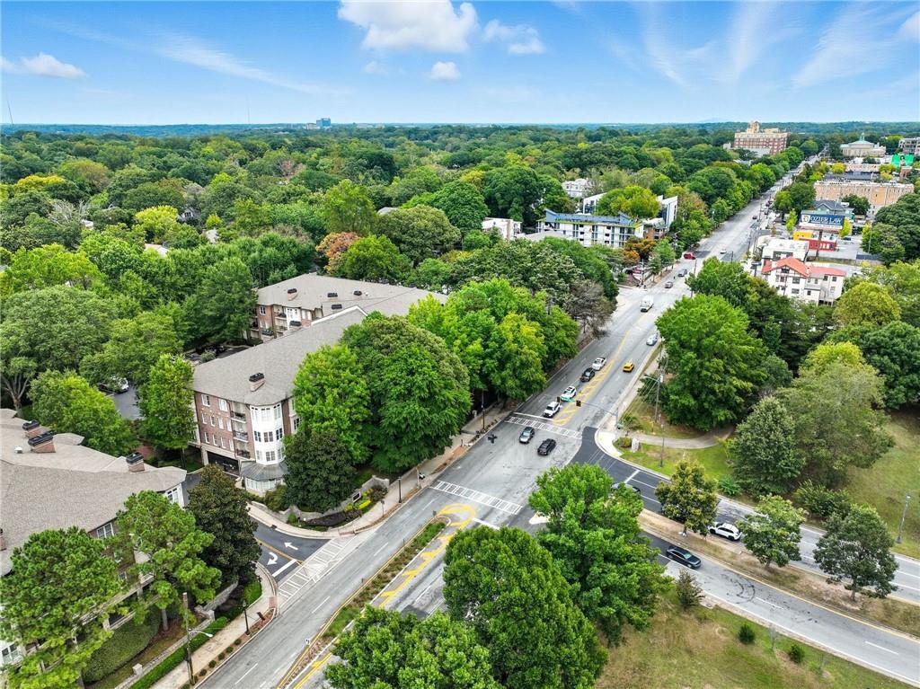 825 Highland Lane Northeast, Unit 1312 Atlanta, GA 30306 - Photo 9 of 46 an aerial view of residential houses with outdoor space and street view