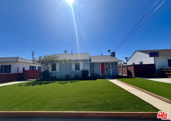 front view of a house with a big yard