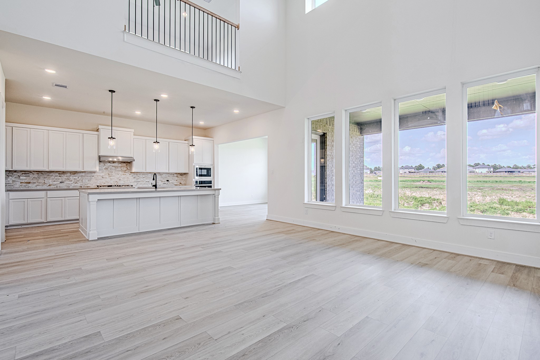 153 Peninsula Point Drive Montgomery, TX 77356 - Photo 17 of 46 Generously sized living area with room for both relaxation and entertaining