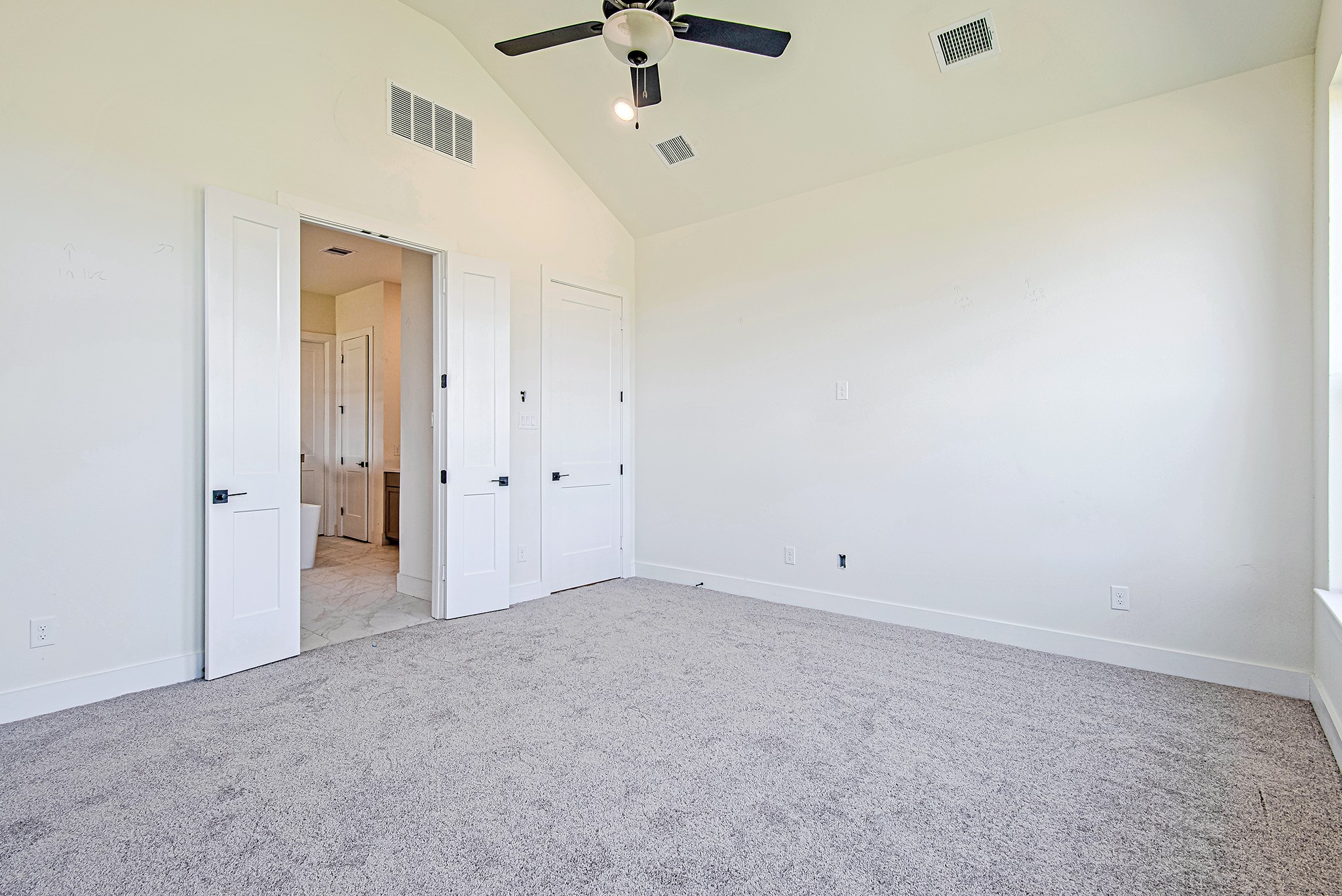 153 Peninsula Point Drive Montgomery, TX 77356 - Photo 19 of 46 The primary suite features plush carpet, a ceiling fan, and serene backyard views
