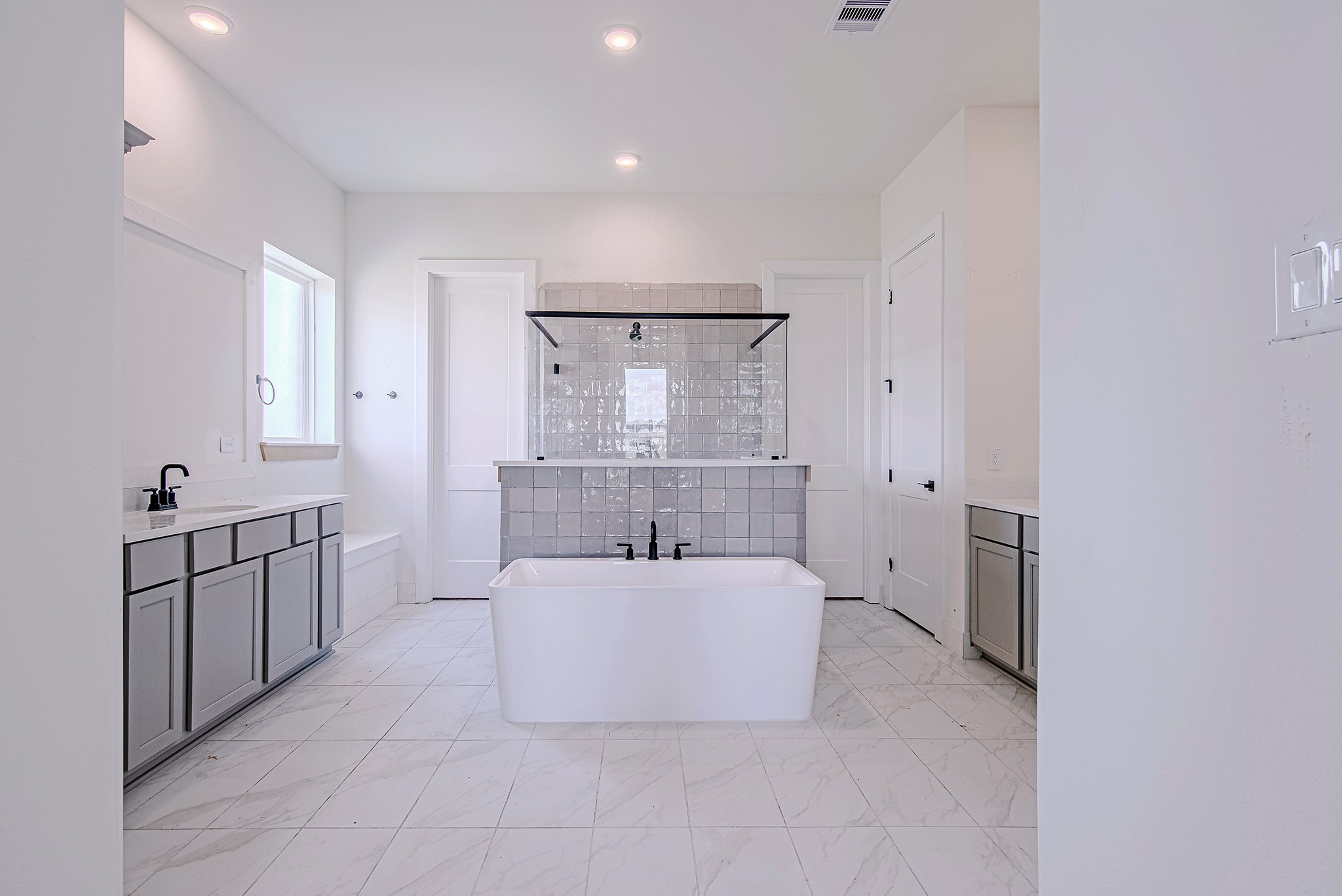 153 Peninsula Point Drive Montgomery, TX 77356 - Photo 21 of 46 Spa-inspired ensuite with dual vanities and abundant counter space