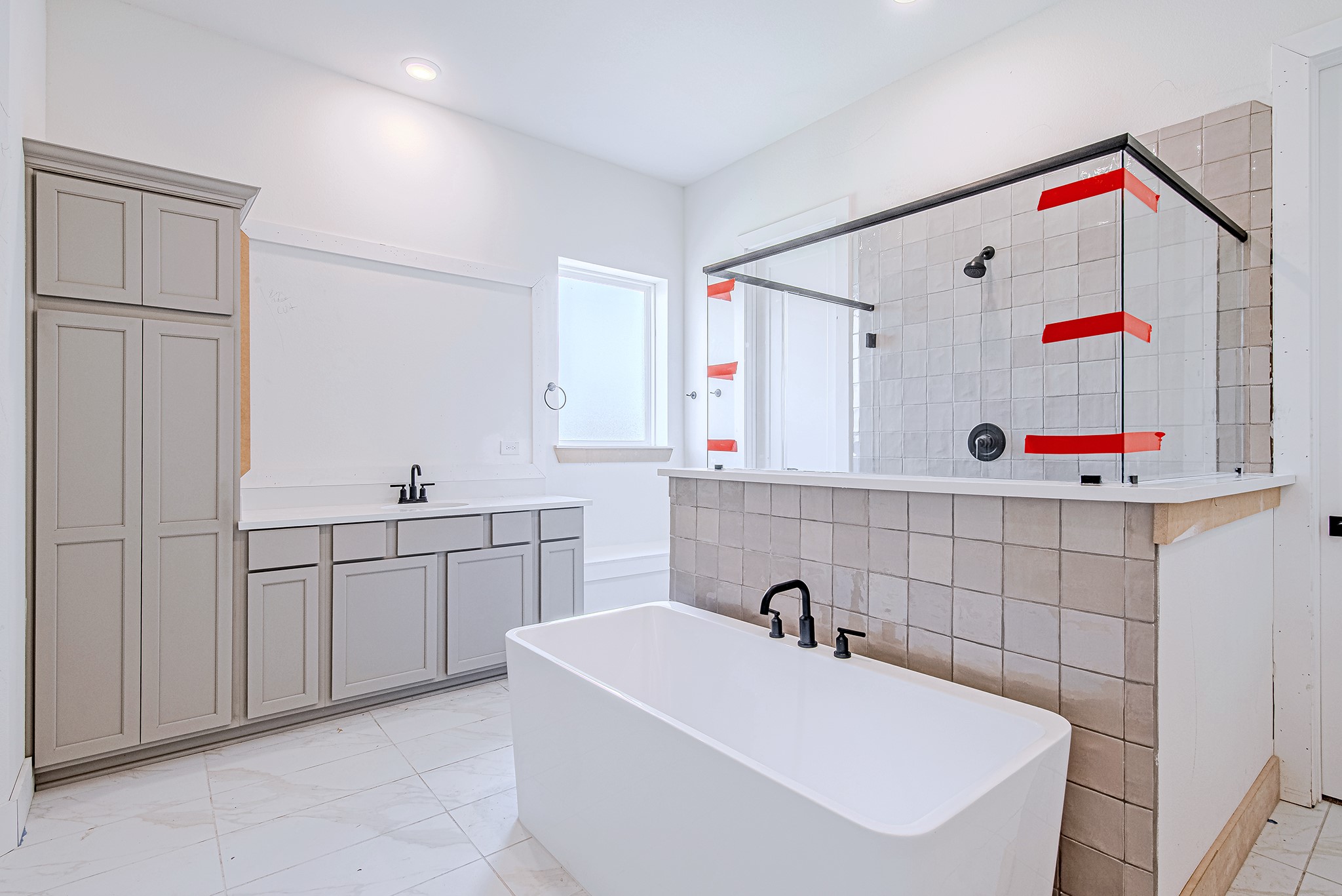 153 Peninsula Point Drive Montgomery, TX 77356 - Photo 23 of 46 Frameless glass shower enclosure with dual showerheads adds a touch of elegance