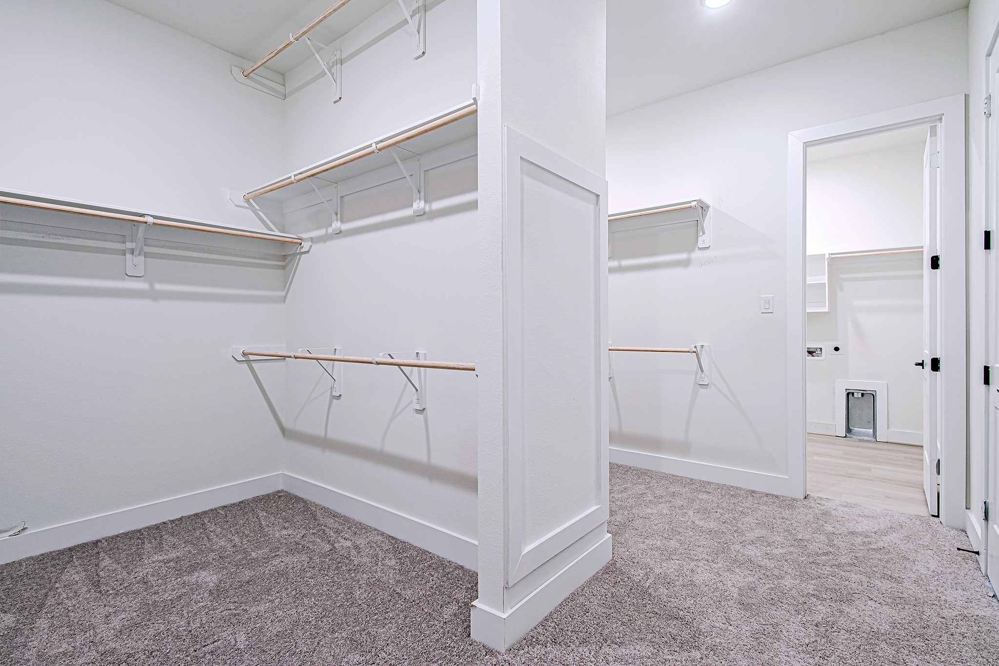 153 Peninsula Point Drive Montgomery, TX 77356 - Photo 25 of 46 Another angle of the primary closet with built-in shelving for easy organization