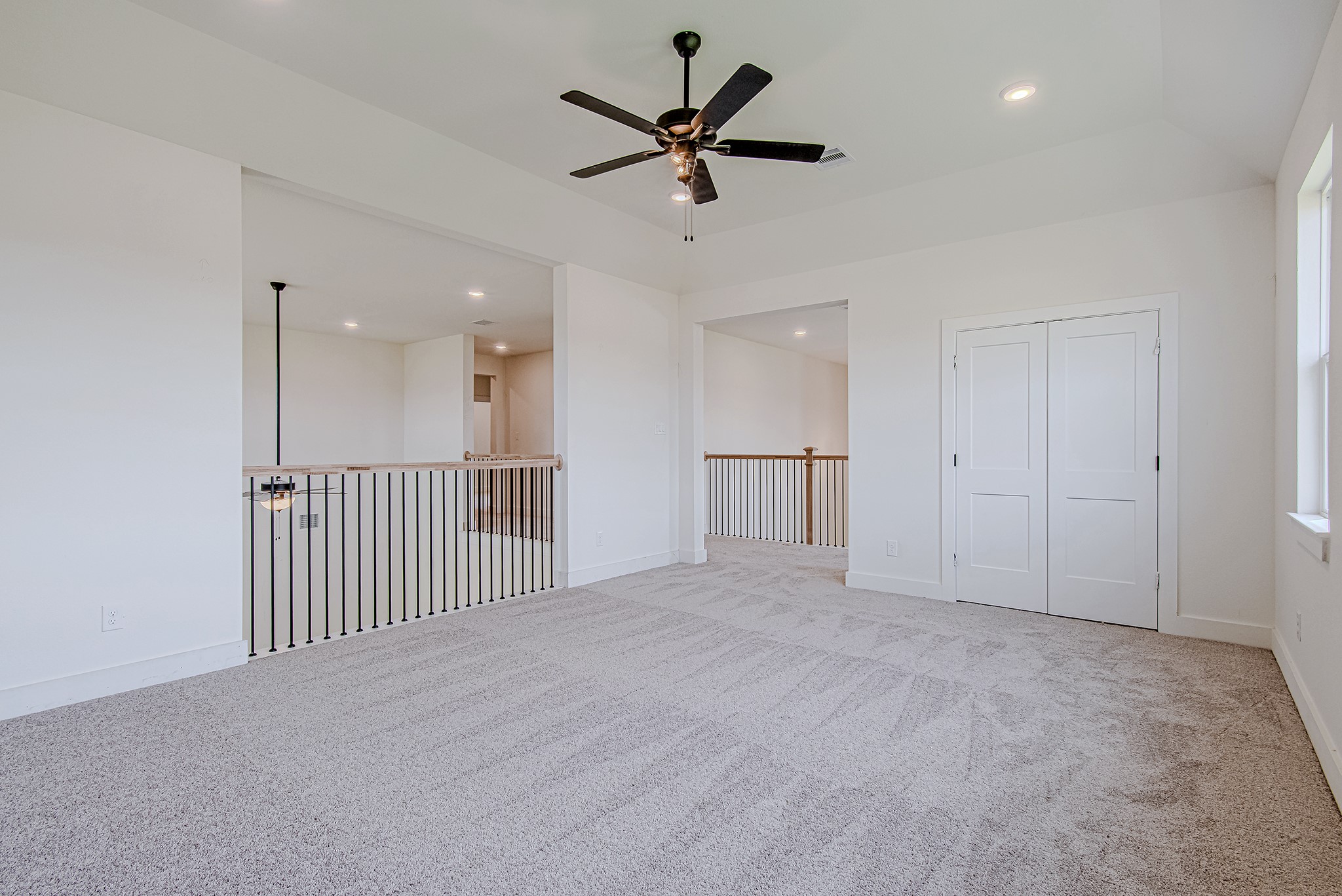 153 Peninsula Point Drive Montgomery, TX 77356 - Photo 33 of 46 Another generously sized bedroom with plush carpet and a versatile layout