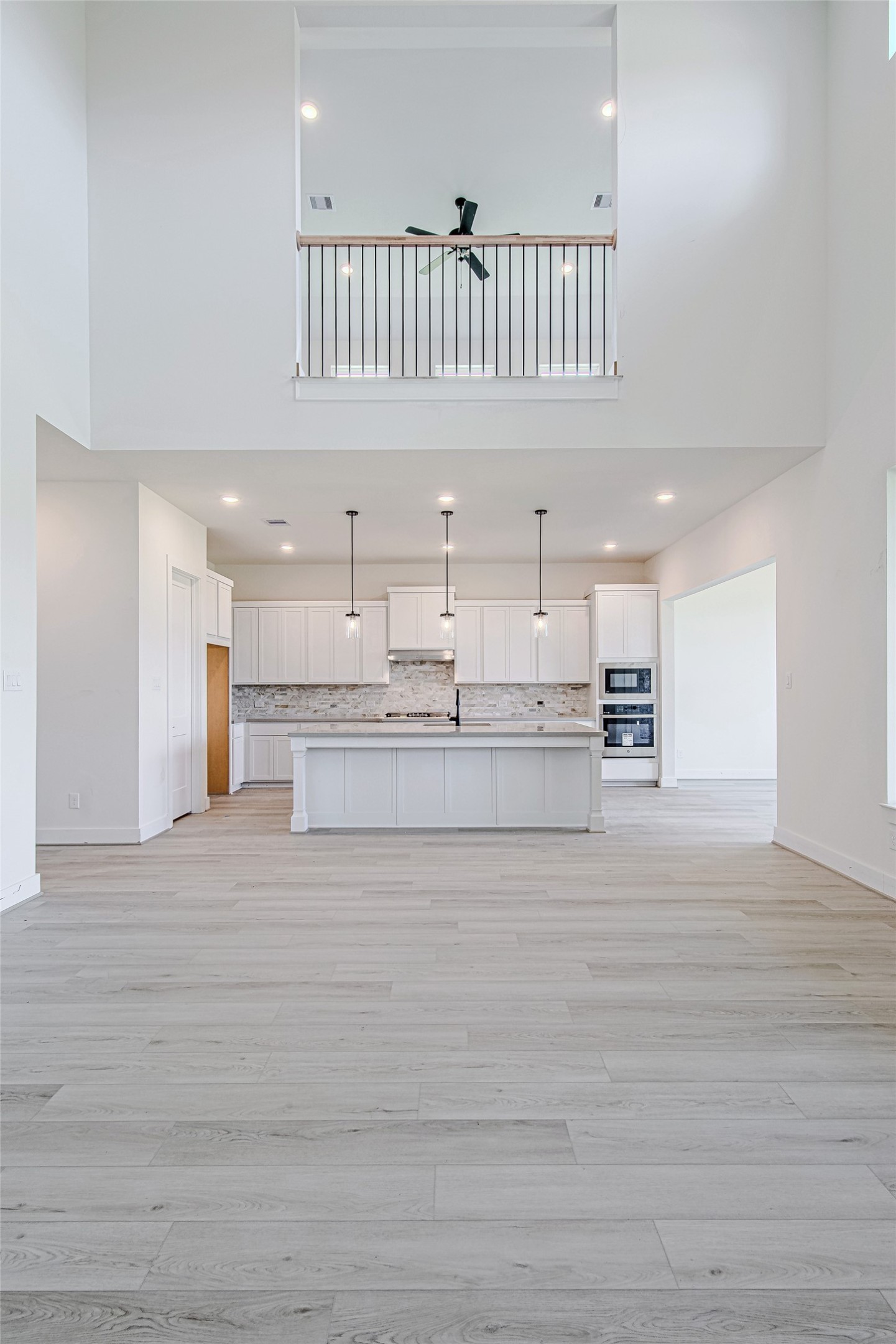 153 Peninsula Point Drive Montgomery, TX 77356 - Photo 9 of 46 Spacious family room with high ceilings, ceiling fan, and versatile layout options
