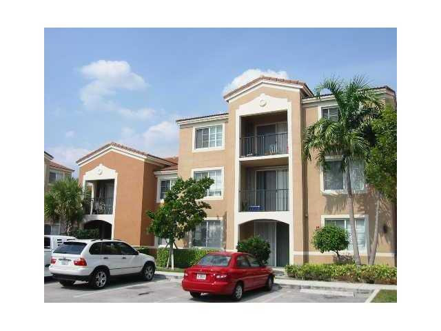 8030 North Nob Hill Road, Unit 106 Tamarac, FL 33321 - Photo 2 of 16 Exterior Front