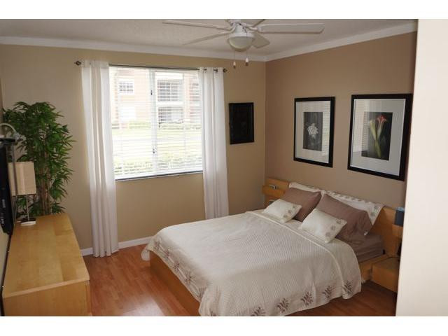 8030 North Nob Hill Road, Unit 106 Tamarac, FL 33321 - Photo 7 of 16 Master Bedroom
