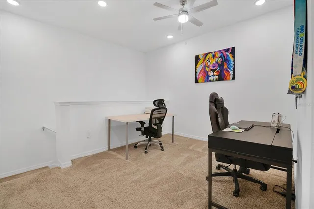 a view of a workspace with furniture